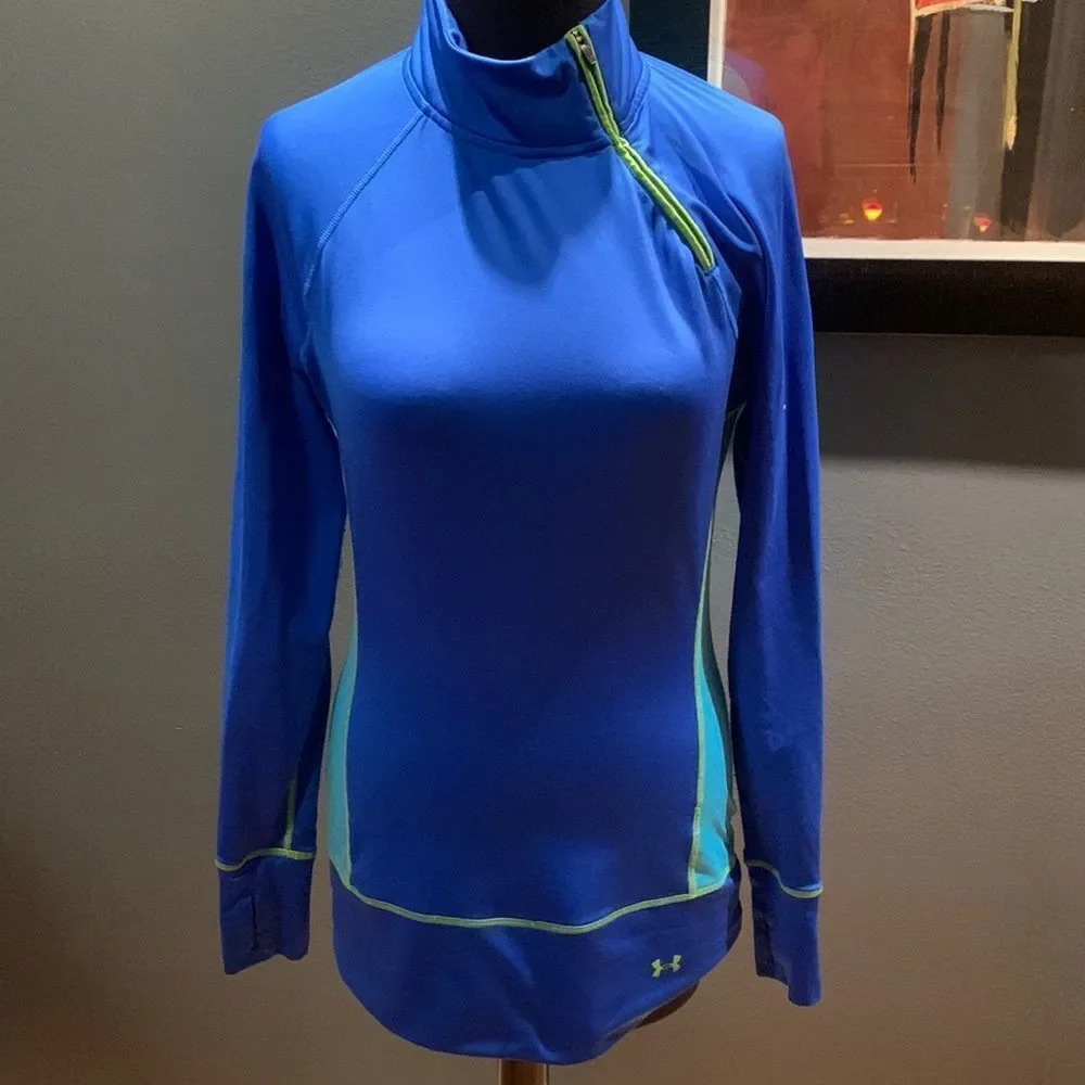 Under Armour blue/aqua color block diagonal 1/4 zip workout top, small. Fitted.